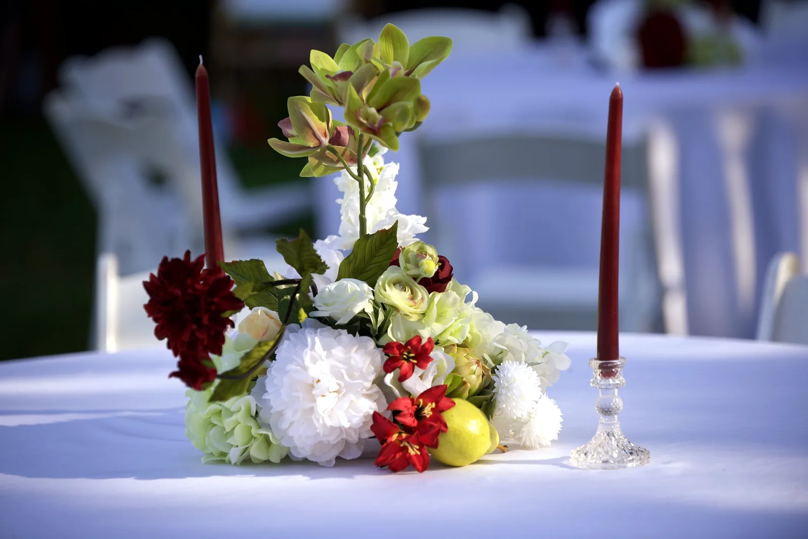 Floral centerpiece with taper candles